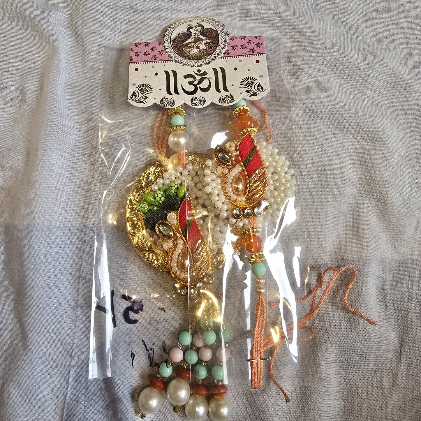 Multi-colour Pearl Bhaiya Bhabhi Rakhi Set – Floral Design