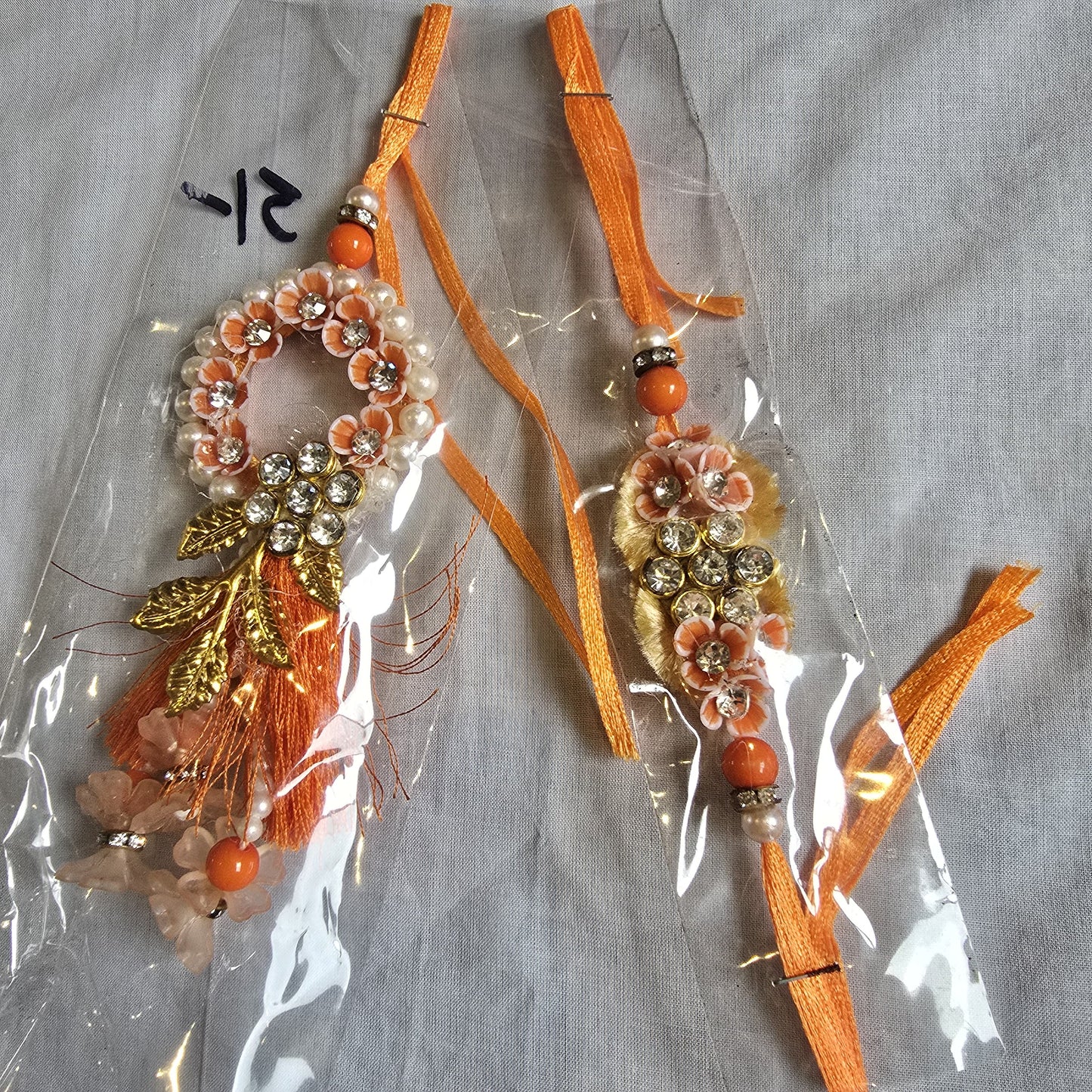 Orange Ring Rakhi- Mirror Work
